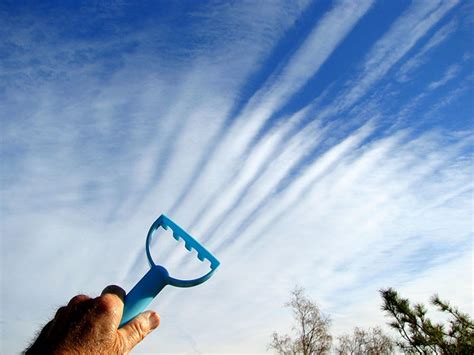 People Playing With Clouds And Forced Perspective Bored