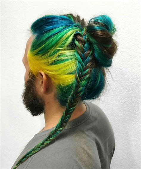 These tail feathers, or coverts, spread out in the peacock is technically a male peafowl of the genus pavo. Peacock colors yellow green dyed blue braided hair @xostylistxo | Long hair styles men, Braided ...