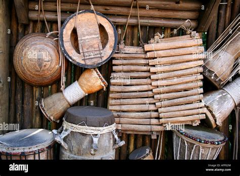 African Drums And Musical Instruments Made Of Wood And Leather In An