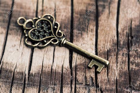 🔥 Download Vintage Key On Wooden Background Stock Photo Picture And