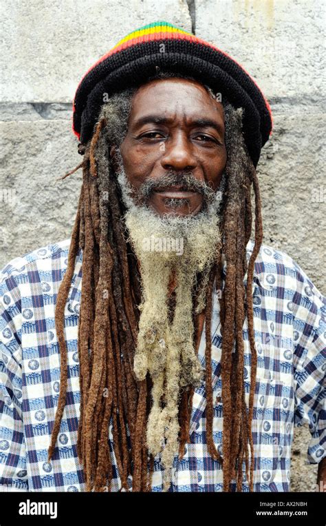 Portrait Of A Middle Aged Older Jamaican Rastafarian Man Wearing A Knitted Hat With Long