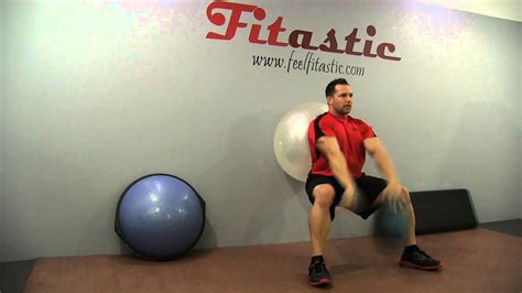 Swiss Ball Isometric Wall Squat With Medicine Ball Bounce
