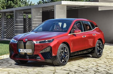 Can barely move forward in the buffet queue before being stopped for another selfie, handshake or hug. BMW iX electric XUV revealed - Autocar India