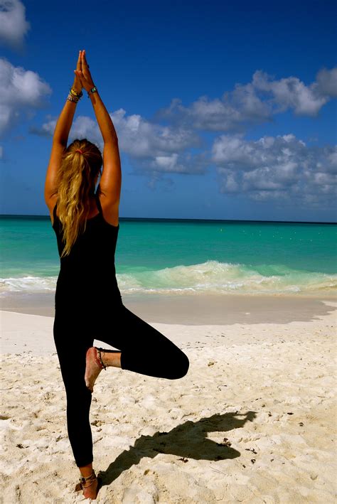 Yoga On The Beach Beach Yoga Basic Yoga Poses Yoga Poses