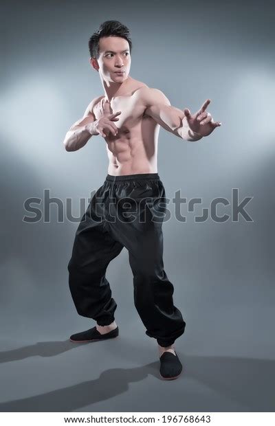 Muscled Asian Kung Fu Man Action Stock Photo Edit Now 196768643
