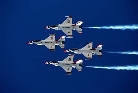 An Air To Air Left Top View Of Four F 16 Fighting Falcon Aircraft In A