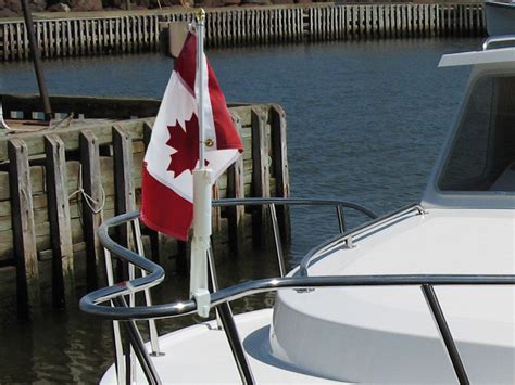 Quick and easy project for just a few dollars. Boat Flagpole | Boat Poles| Flagpole for railing
