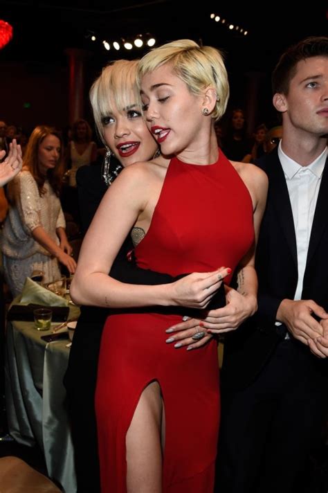 The Grammys Rita Ora And Miley Cyrus Kiss At Pre Grammys Party Metro