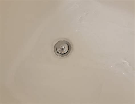 Slow Draining Bathtub Possible Causes And Solutions