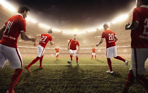 Hd Wallpaper Soccer Players In Red Soccer Jersey Playing Soccer On