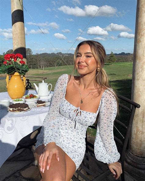 Icon Of Beauty Ashley Menin Shows Off Her Extremely Seductive Figure Wearing A Lovely Floral Dress