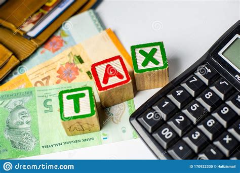 Semenanjung malaysia / peninsular sabah & labuan sarawak. Tax Time Concept - Calculator And Malaysia Ringgit On ...