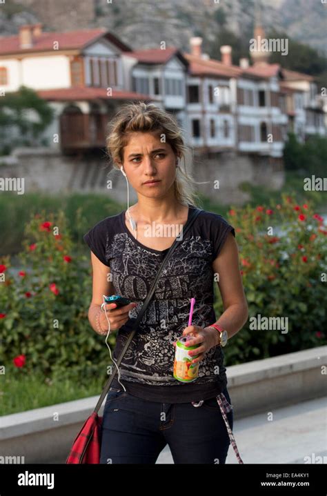 Modern Turkish Girl Strolling In Riverside Park Amasya Turkey Stock