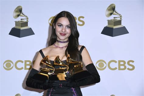 Olivia Rodrigo Breaks One Of Her Grammys In Half Backstage