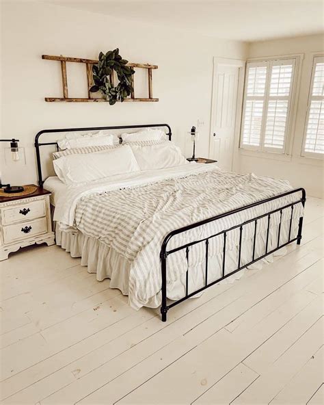 King Black Bed Frame With Striped Bedding Soul And Lane