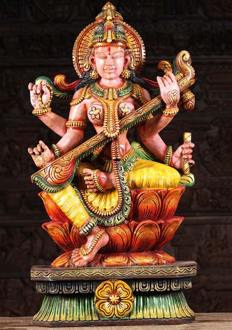 Sold Wooden Statue Of The Radiant Saraswati Playing The Veena Holding
