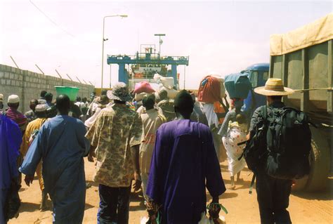 Boarding The Ferry That Crosses The River Gambia To The Capital Banjul A Picture From Banjul