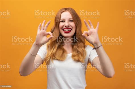 Happy Girl Is Showing Ok A Two Handed Gesture Human Emotions Concept
