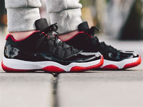 Let us know if your feeling these in the comments. Air Jordan 11 Low Black Red - Date de sortie - Release date