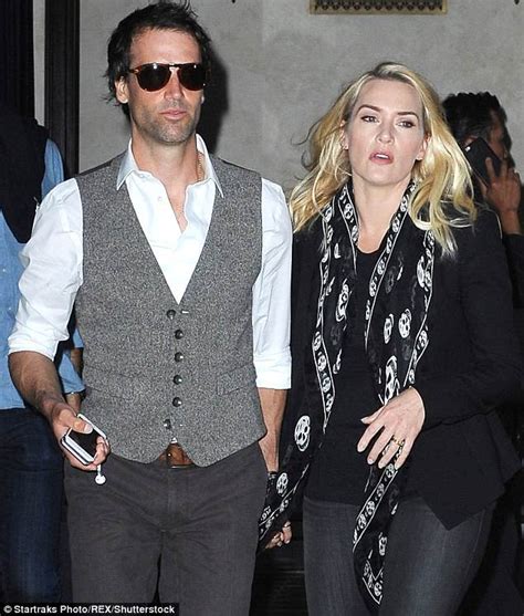 She has won a grammy award, an academy. Kate Winslet shows off her figure as she packs on the PDA ...