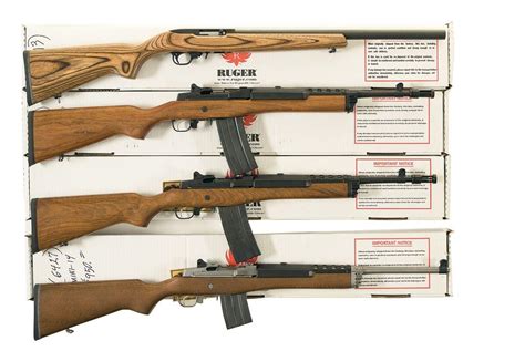 Four Ruger Semi Automatic Rifles A Ruger Model 10 22 Semi Automatic Rifle With Factory Box B Rug