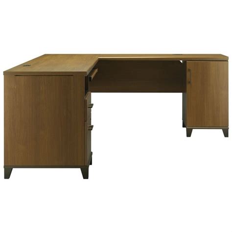 There are casters under the desk, so it would be easy to rotate the desk. Bush Furniture Achieve L Shaped Computer Desk in Warm Oak ...