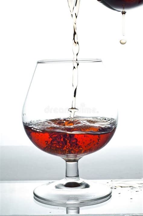 Alcohol Drink Pouring Into Glass Stock Photo Image 25075814