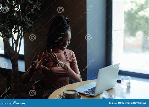 Happy Smiling Afro American Woman Showing Heart With Hands And Talking On Laptop Online In