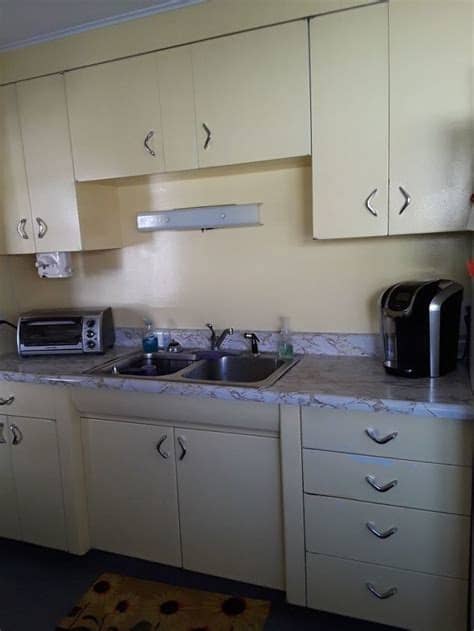 Old kitchen cabinet deserves a new chance. How can I change up old metal kitchen cabinets besides ...