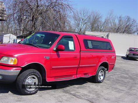 1999 Ford F 150 Xlt Standard Cab Pickup 2 Door 5 4l 4x4 Bright Red