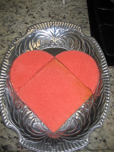 Pipe the filling (i use a plain round tip) onto one of the eight shapes. How to make a heart shaped cake - C.R.A.F.T.