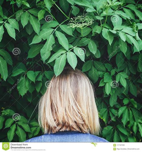 Blond Woman Standing Backwards Beside The Trees Stock Image Image Of