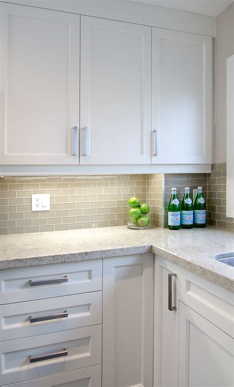 The subtle gray veining of the backsplash tile does not clash or compete with the granite's dramatic patterning, but rather enhances the white veining. Kashmir white granite countertops Showcasing Striking ...