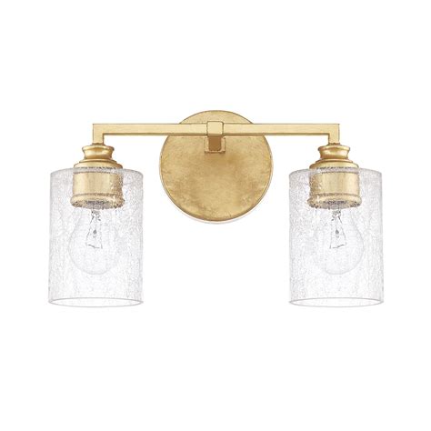 Satin white glass globes are nested behind rings of gold which dramatically contrasts against the black metal background. Capital Lighting Fixture Company Milan Capital Gold Two ...