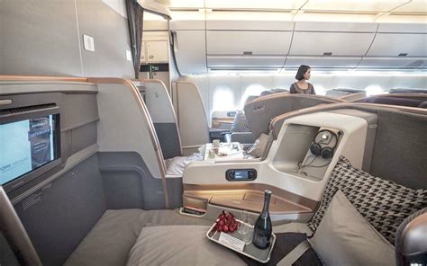 Singapore airlines' business class seat is the widest seat to be found on any aircraft or airline. Singapore Airlines Business Class Review - A Modern Wayfarer