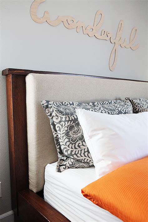 Your headboard, for example, can easily be transformed with just a few hours of upholstery work. DIY upholstered headboard insert and pillows