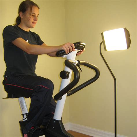 Sad stands for seasonal affective disorder, and sad lamps are designed as a form of light therapy to help alleviate things. Person working out in front of Flamingo - Shine A Light On Sad