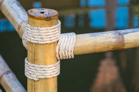 Rope Tied Knot At Bamboo Wood Stock Image Image Of Design Yellow