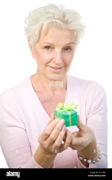 Old Woman Holding Present Stock Photo Alamy