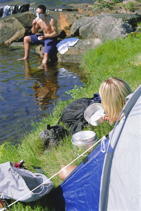 Couple Camping In The Great Outdoors Stock Image Image Of Sitting Colour 6078137
