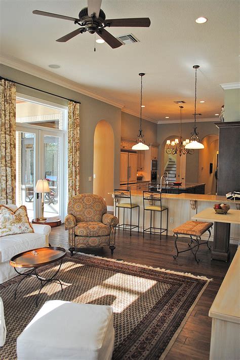 Tips for staging your home to sell. Mediterranean Living Room with Open Concept | HGTV