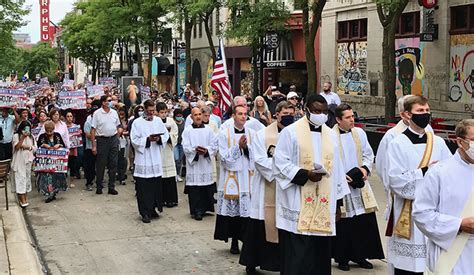 bishop hying and archbishop listecki lead eucharistic procession in madison wi catholic mass