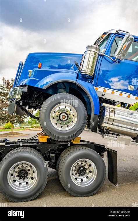 Powerful Day Cab Industrial Big Rig Semi Truck Towing Another Semi