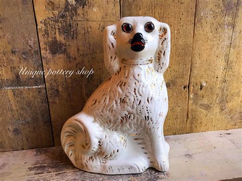 A Stunning Antique Ceramic Flatback Ceramic Dog Figurine By