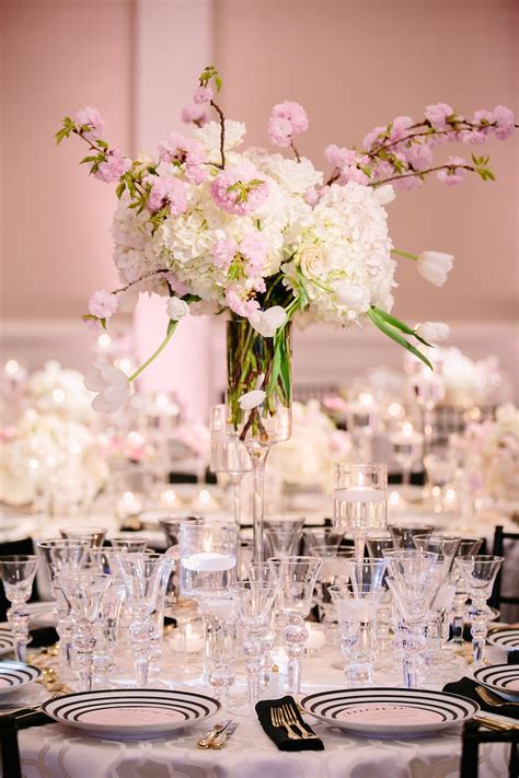 Our eyes are fixated on a breathtaking wreath of blooming white branches as the ceremony arch created. 18 Ideas to Steal for Your Cherry Blossom-Themed Wedding ...