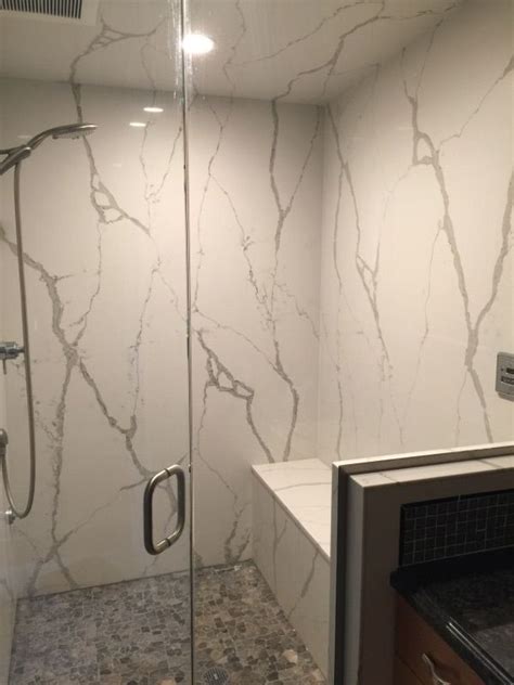 The calacatta gold marble collection at tilebuys features waterjet mosaics, polished field tile for bathroom and shower. Calacatta Vagli shower walls white marble look shower, www ...