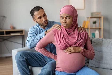 Prenatal Contractions Pregnant Muslim Woman Suffering From Abdominal Pain And Caring Arab