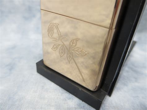 The highly anticipated high polish rose gold lighter is finally here. ROSE Laser Engraved Rose Gold Lighter (Zippo, 351RG, 2000 ...