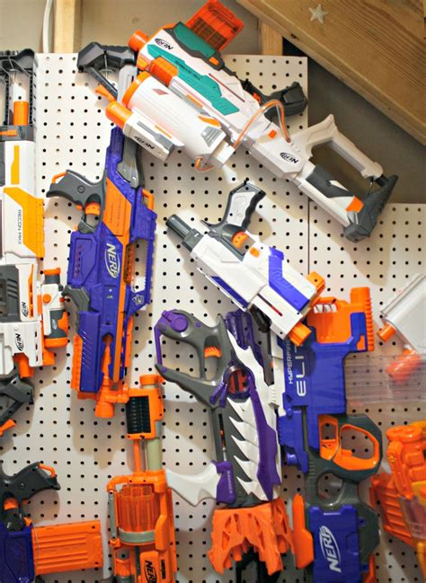 As our boys get older, their interests seem to have narrowed to a few main things: Easy DIY Nerf gun storage from Thrifty Decor Chick