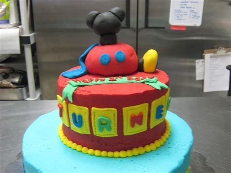 Step 2.to make the cake step 2.to make the cake add two spoons of magic, one tinker belle wing (they are very rare and cannot be found in tescos maybe asda) one knob. A super-cute Mickey Mouse cake for a special 1-year-old ...